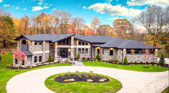 Completed home with circular drive